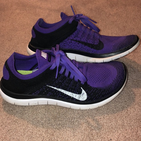 black and purple nike shoes
